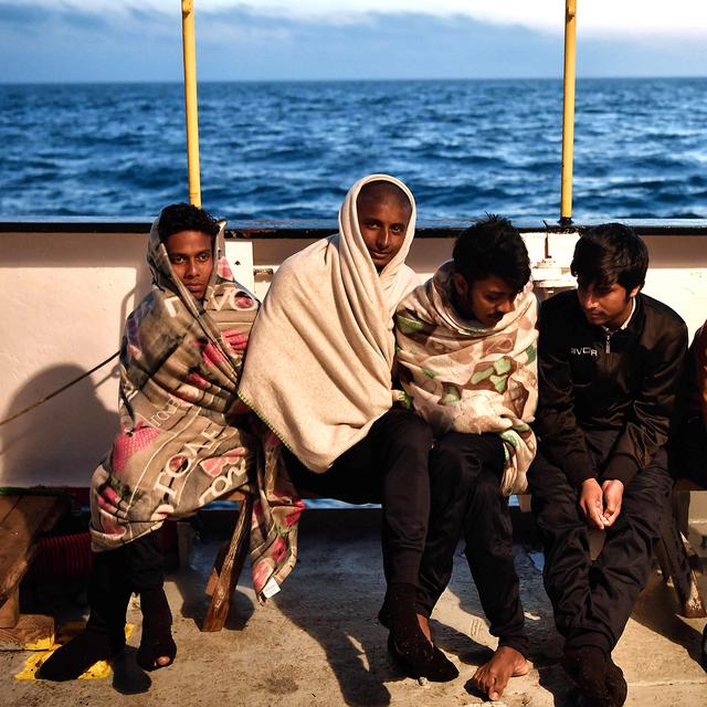 Des migrants à bord du MV Aquarius. [AFP - Louisa Gouliamaki]