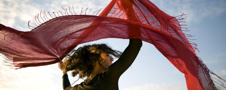 Une femme dansant la pizzica, danse traditionnelle du sud de l'Italie. [AFP - Daniele La Monaca / AGF / Photononstop]