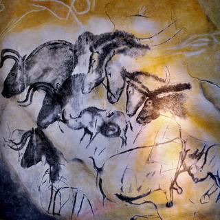 Peintures à l'intérieur de la grotte Chauvet. [CC BY-SA 2.0 - The Adventurous Eye - Flickr]