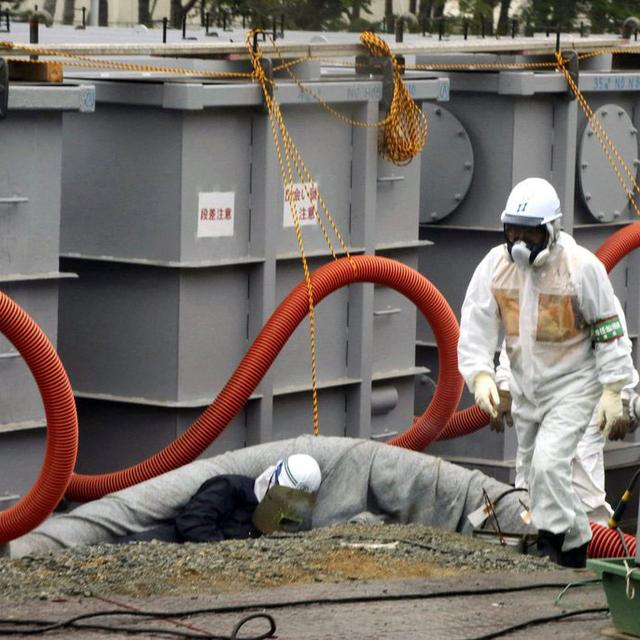 La société Tepco estime cque les citernes seront pleines à la centrale de Fukushima, en 2022. [Pool/EPA/Keystone - Noboru Hashimto]