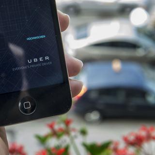 Les taxis Uber se commandent via l'application de la compagnie.
Christian Beutler
Keystone [Keystone - Christian Beutler]