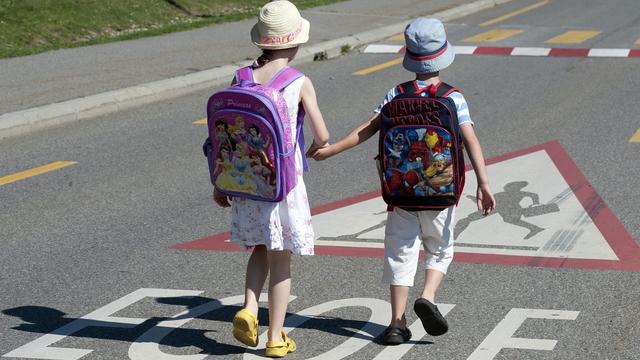 Des élèves vaudois sur le chemin de l'école.
dominic favre
Keystone [Keystone - Dominic Favre]