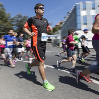 Plus de 27'000 participants ont pris part aux courses des 20 km de Lausanne en 2017. [Keystone - Cyril Zingaro]