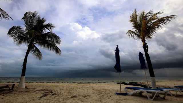 Une plage mexicaine à l'approche de l'ouragan Nate, en 2017. [AFP - Elizabeth Ruiz]