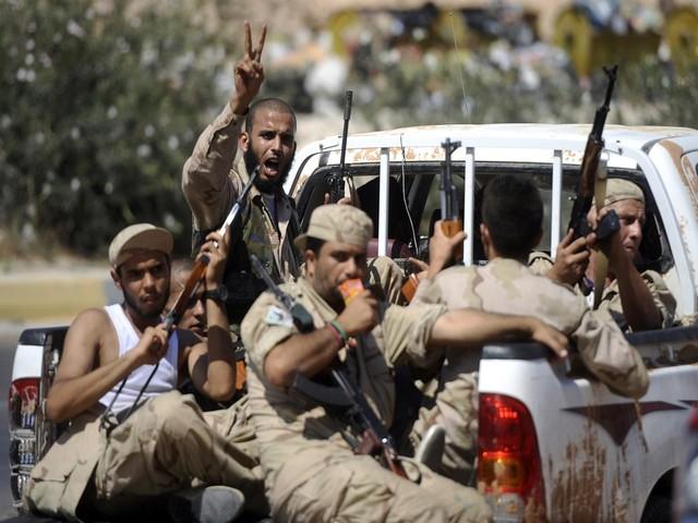 En Libye, les troupes rebelles poursuivent leur avancée sur le terrain. [Filippo Monteforte / AFP]