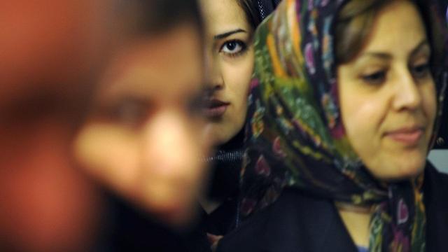 Femmes voilées. [Fred Dufour / AFP]