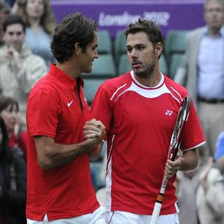 Roger Federer et Stanislas Wawrinka se sont qualifiés pour le double aux JO de Londres. [Jean-Christophe Bott-Keystone]