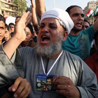 Les partisans des Frères musulmans défilaient, lundi, place Tahir, pour célébrer la victoire. [Keystone - Mohamed Messara]