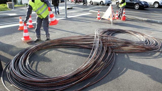 Des câbles de fibre optique. [Keystone - Salvatore Di Nolfi]