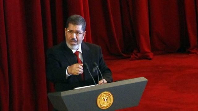 Mohamed Morsi prononçant son discours, ce samedi 30 juin. [Ahmed Abdel Fattah / Keystone]