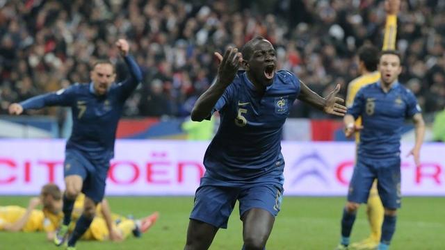 L'équipe de France s'est qualifiée pour la Coupe du monde 2014 au Brésil en battant l'Ukraine 3 à 0. [Michel Euler - AP]