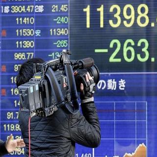 Au Japon, les Bourses ont chuté. [Koji Sasahara / Keystone]