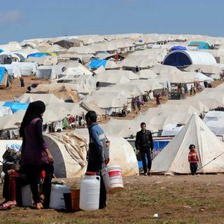 Des réfugiés syriens. [Aleppo Media Center AMC - Keystone]