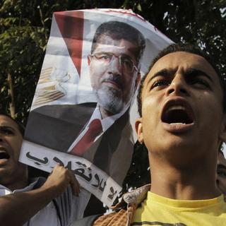 Les supporters de l'ex-président égyptien déchu Mohammed Morsi. [Amr Nabil / AP Photo]