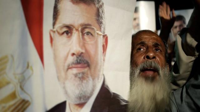 Les Frères musulmans appellent à manifester pour réclamer le retour de l’ex-président Morsi. [Hassan Ammar - AP Photo - Keystone]