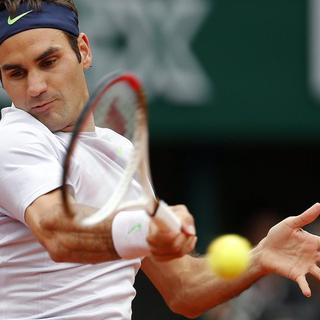 Roger Federer s'est imposé en trois manches face au Français Julien Benneteau. [Ian Langsdon - EPA / Keystone]