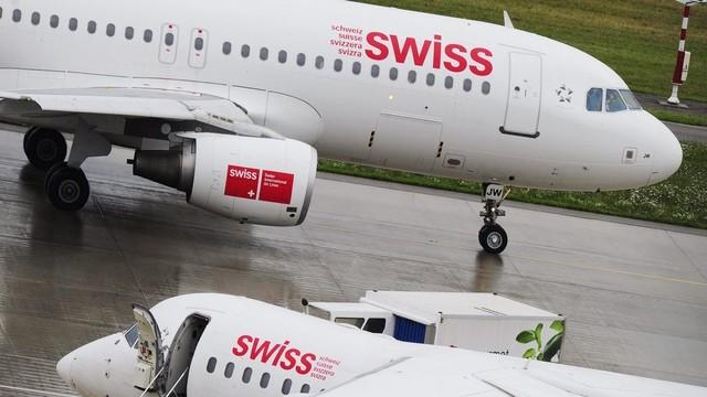 Swiss est contre le projet européen de taxe carbone pour les compagnies aériennes. [Steffen Schmidt - Keystone]