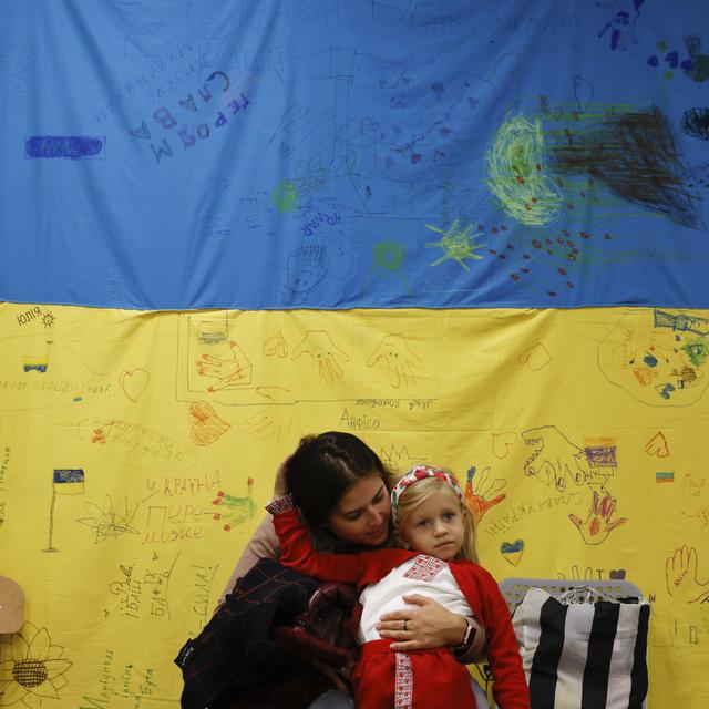 Un plan de mise en œuvre de la levée du statut S a été élaboré par le SEM.. [AP Photo - Michal Dyjuk]