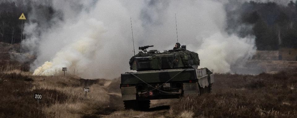 Un Leopard 2 lors de l'exercice sur la base militaire à Swietoszow, le 13 février. [AFP - Wojtek RADWANSKI]