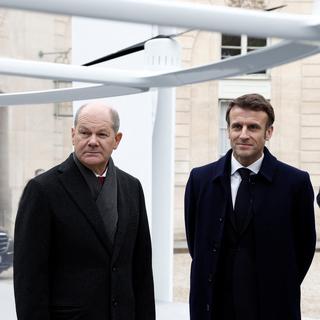 Emmanuel Macron accueille Olaf Scholz à Paris pour les 60 ans de la réconciliation franco-allemande. [EPA - Benoit Tessier]