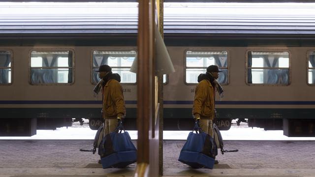 Un réfugié du nom de Mohamed se prépare à prendre un train qui l'emmènera hors de la zone risquée et parfois mortelle du Nord de l'Italie (image d'illustration). [TiPress / KEYSTONE - Pablo Gianinazzi]