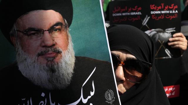 Le portrait de Hassan Nasrallah,  le chef du Hezbollah dont Israël a annoncé le décès, lors d'une manifestation à Téhéran, en Iran, le 27 septembre 2024. [KEYSTONE - VAHID SALEMI]