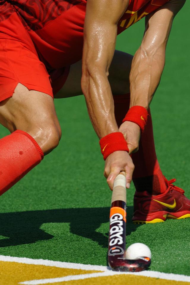 Détail d'un joueur lors d'un match d'hockey homme entre la Chine et l'Afrique du Sud lors des JO de Pékin 2008. [CIO - Hélène Tobler]