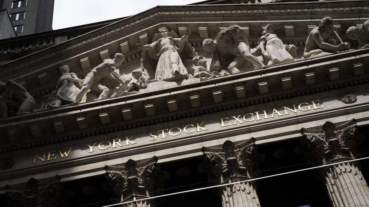 Cinq groupes chinois annoncent se retirer de la Bourse de New York [AP Photo - John Minchillo]