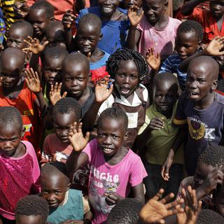 Des enfants sud-soudanais dans un camp pour réfugiés en Ouganda [Keystone - Ben Curtis]