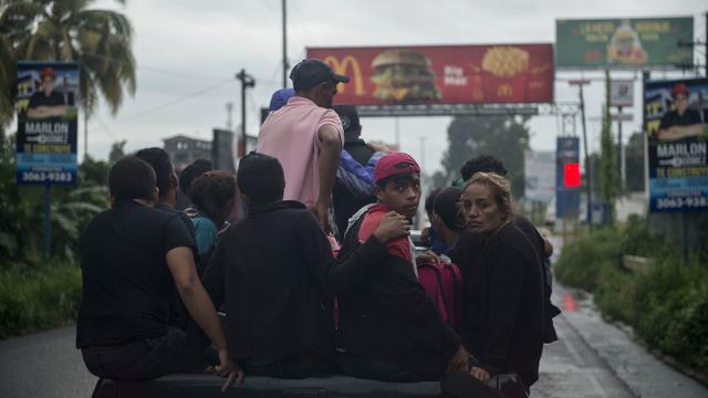 Les migrants honduriens se trouvent à la frontière nord du Guatemala. [Keystone - Oliver De Ros]