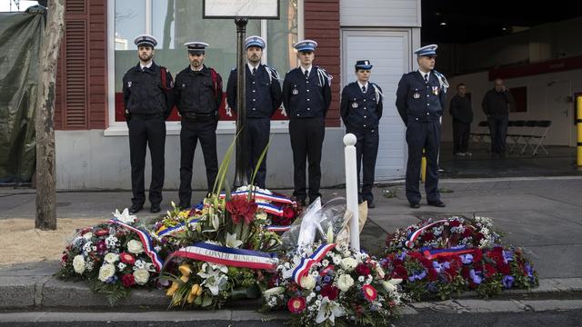 French police officers and colleagues of the late policewoman Clarissa Jean-Philippe stand in line during a ceremony honoring her, killed by Amedy Coulibaly in Montrouge near Paris, France, 08 January 2018. 17 victims were killed in Islamic extremist attacks on satirical newspaper Charlie Hebdo, a kosher market and police in 2015. EPA/ETIENNE LAURENT [Keystone - Etienne Laurent]