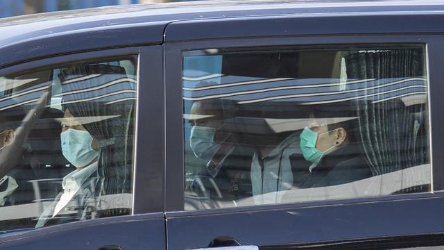 Un des activistes hongkongais détenus par les autorités chinoise (deuxième depuis la droite). [AP Photo - Kin Cheung]