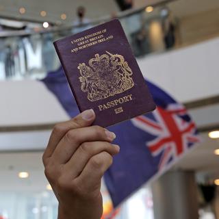 Boris Johnson pourrait proposer à des millions d'habitants de Hong Kong des passeports. [AP Photo - Kin Cheung]