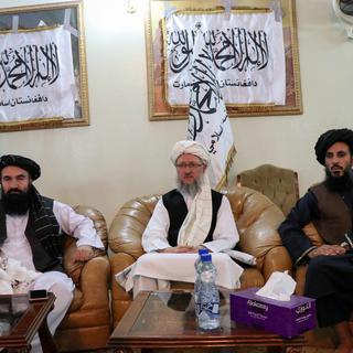 Des Talibans lors d'une conférence de presse le 18 août 2021. [EPA - Stringer]