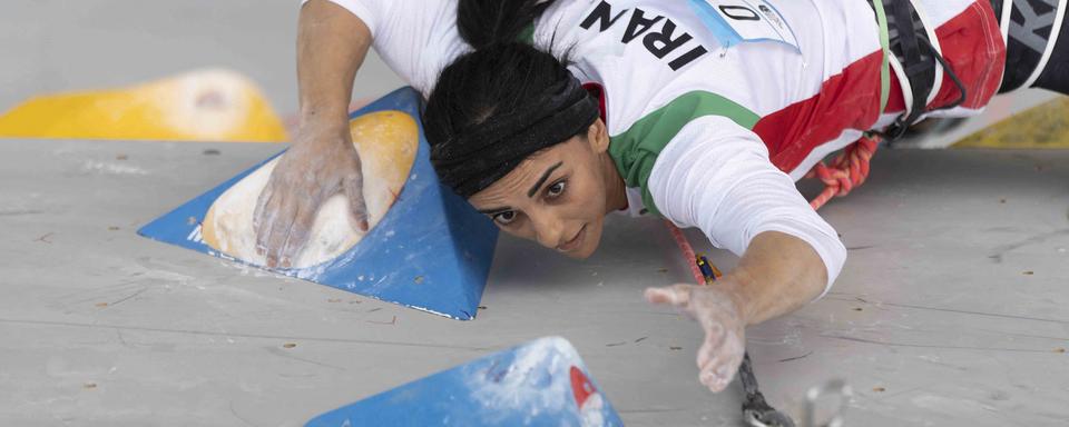 La grimpeuse irannienne Elnaz Rekab a participé aux championnats d'Asie d'escalade non-voilée [INTERNATIONAL FEDERATION OF SPORT CLIMBING / AFP - RHEA KANG]