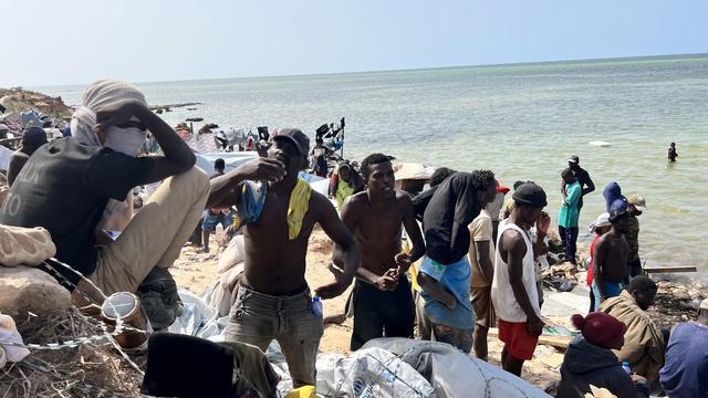 Tunis et Tripoli collaboreront dans l'accueil de migrants africains. [Keystone - STR]