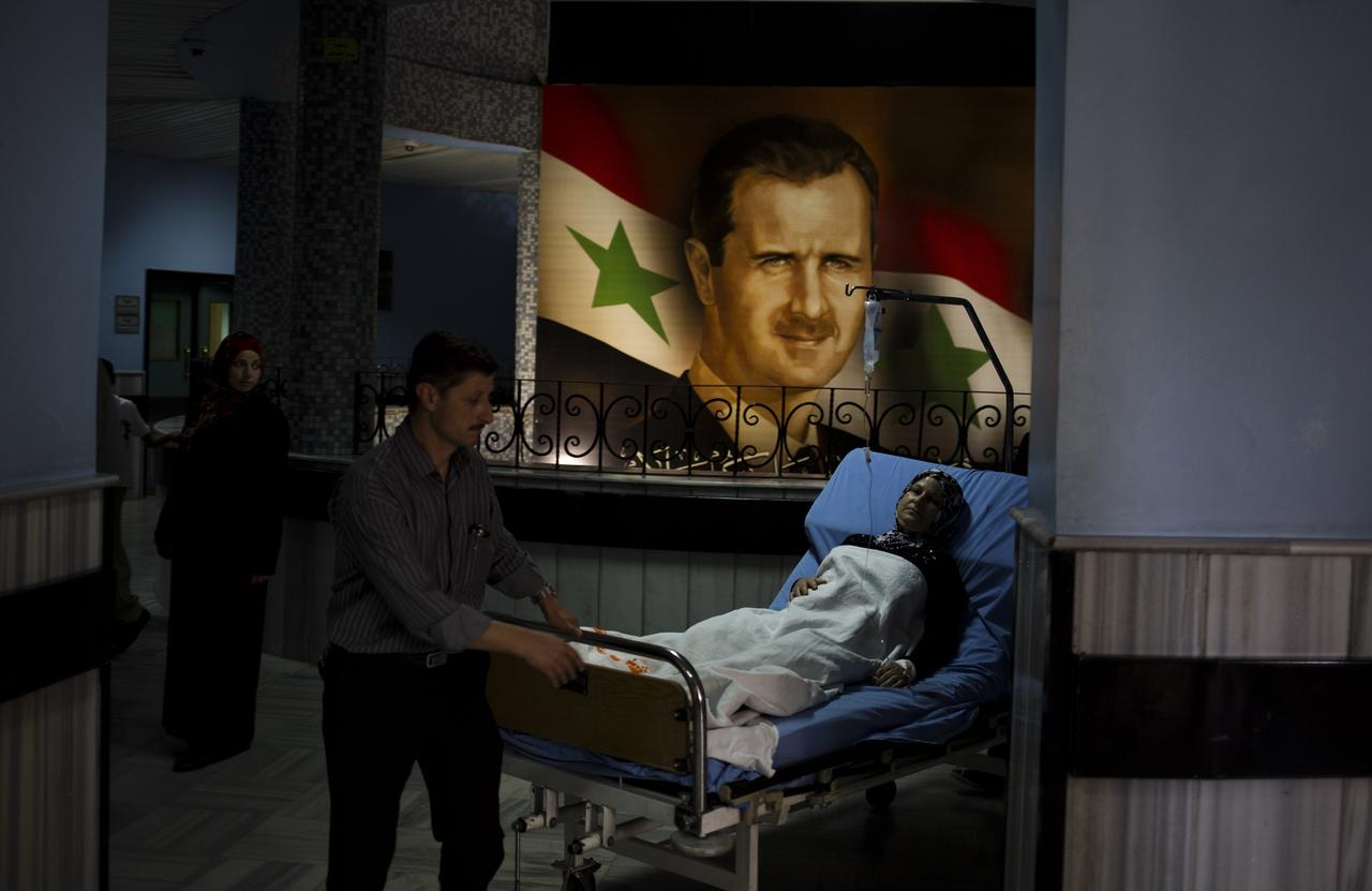 Bachar al-Assad a violemment réprimé la révolte contre son régime en 2011 ; la guerre civile qui a suivi a fait un demi-million de morts. Ici, une image prise en mai 2014 dans un hôpital de la capitale Damas. [KEYSTONE - DUSAN VRANIC]