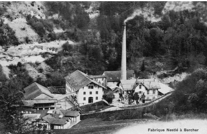 La fabrique Nestlé à Bercher, établie en 1880 dans un ancien moulin, reliée à la gare de Bercher par un téléphérique. [Carte postale éditée par James Perret, 1910 - James Perret]