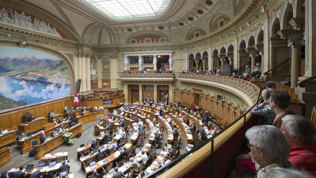 Le Conseil national en séance lors de la session d'été 2015. [Keystone - Peter Klaunzer]