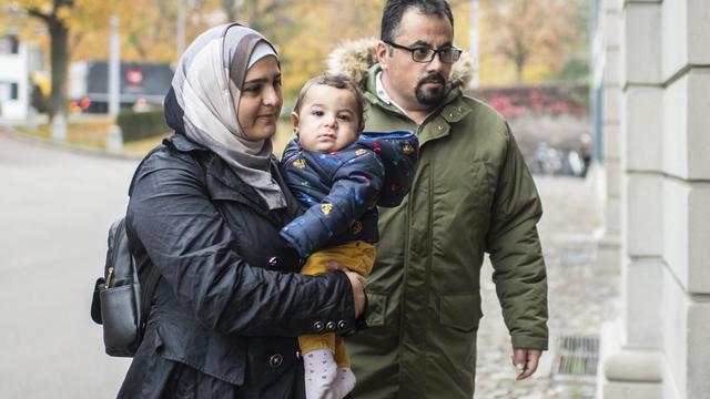 La famille syrienne, dont la femme était enceinte de sept mois, avait été interceptée à la frontière franco-suisse début juillet 2014. [Keystone - Ennio Leanza]