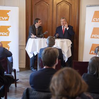 Le président du PDC Gerhard Pfister (gauche) et le vice-président du parti Filippo Lombardi. [Keystone - Anthony Anex]