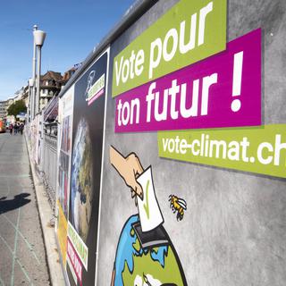 Une affiche des Jeunes Verts à Lausanne lors de la campagne pour les élections fédérales de 2019. [Keystone - Laurent Gillieron]
