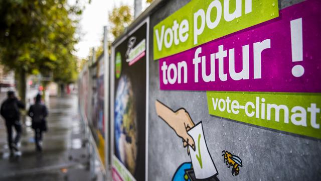 Des affiches des verts vaudois pour les élections fédérales de 2019. [Keystone - Jean-Christophe Bott]