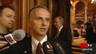 Suisse: Didier Burkhalter a dû défendre le paquet de mesures lancées par Pascal Couchepin devant le Parlement