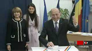 Roumanie: le président sortant Traian Basescu est réélu de justesse pour un nouveau mandat de cinq ans