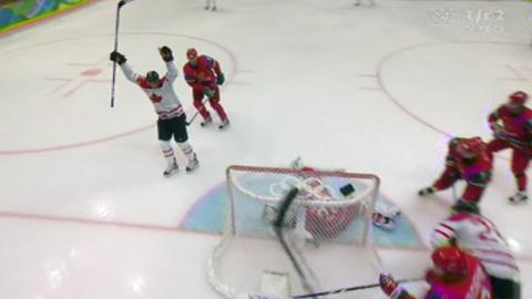 JO Vancouver / Hockey sur glace: Le Canada ouvre la marque d'entrée de jeu contre la Russie par Ryan Getzlaf.