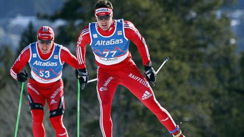 Premier podium CDM de l'hiver pour Cologna, qui devance ici Fischer.