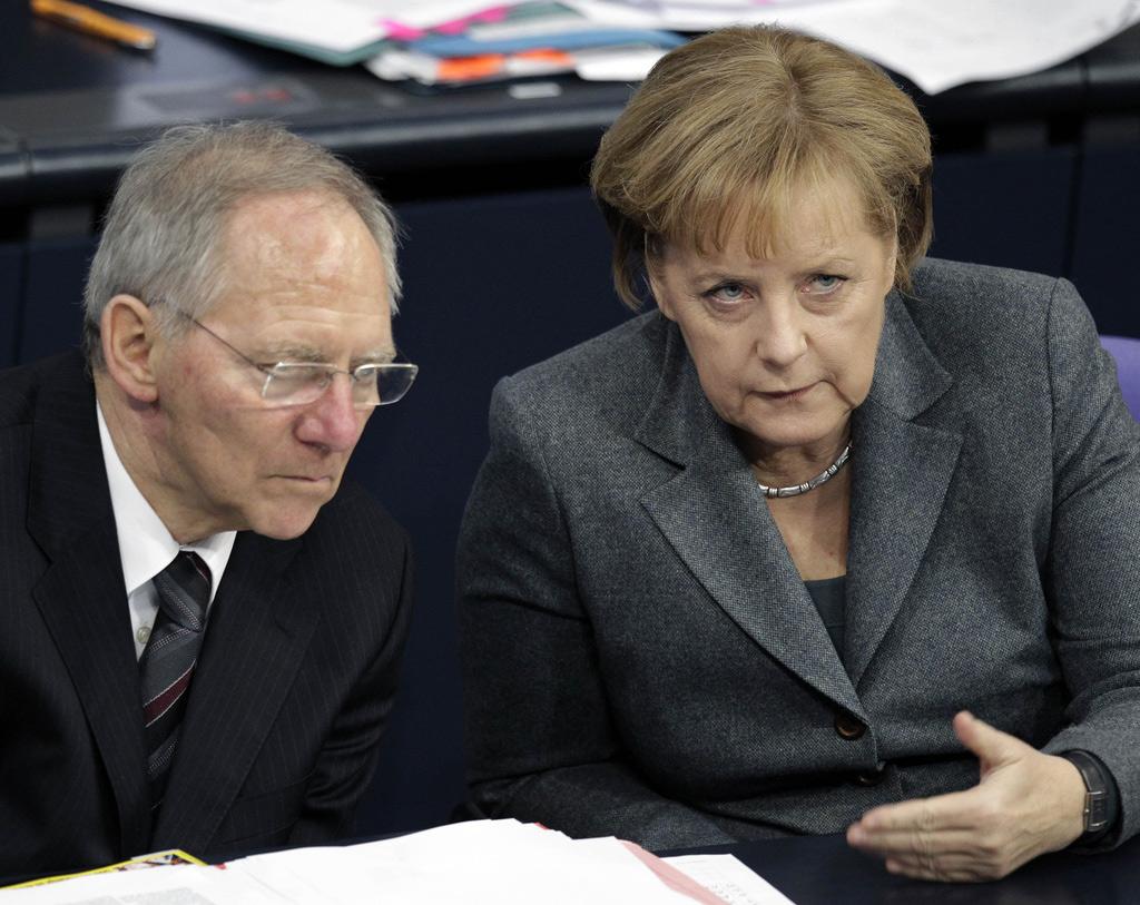 La chancelière allemande Angela Merkel et son ministre des finances Wolfgang Schäuble en 2010. [Keystone]