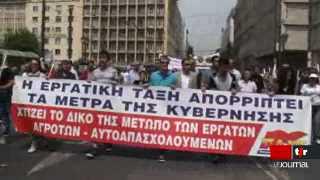 Grèves à Athènes: le suivi de manifestants pendant une journée