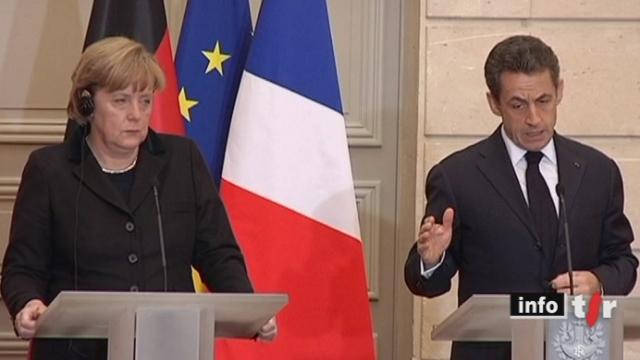A trois jours du sommet européen de la dernière chance pour sauver l'euro, Nicolas Sarkozy et Angela Merkel ont sorti un nouveau traité de leur chapeau